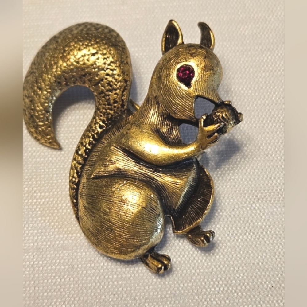 Vintage Brass Finished on Metal Squirrel Holding a Nut with Red Gem Eyes Brooch